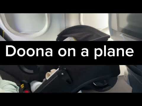 Doona Installed on a Plane Seat