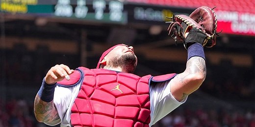 With 14,865th putout, Yadi sets MLB record