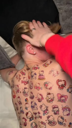 branson on Instagram: "decorating my boyfriend with Hello Kitty tattoos @henrycmetzger . . . #couple #couplegoals #lgbt #hellokittylover #gay #reels"