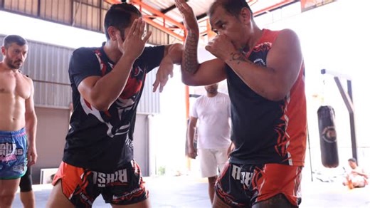 Tiger Muay Thai on Instagram: "Coaching in our Muay Boran class, traditional Thai martial arts master Kru Oh teaches the technique of “sok tat” (horizontal elbow) offense and defense ⚔️ Muay Boran (translated into English as “ancient boxing”) is the term used to encompass the various styles of Thai martial arts before they were modernized in the early 20th century with the introduction of rules, western boxing rings and equipment. Muay boran utilizes all kinds of striking attacks as well as join