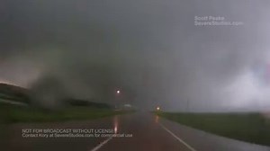 21K views · 346 reactions | Huge, rain-wrapped wedge tornado impacts areas from Lawrence, to Linwood, to near Bonner Springs, Kansas on Tuesday evening! - Scott Peake Weather | SevereStudios Storm Chasers | Facebook