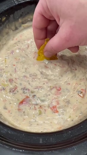 Crockpot Sausage Cheese Dip is easy to make and so good! Recipe 1 lb sausage (I use mild country sausage) 1 block (32oz) Velveeta Queso Blanco 2 cans of Rotel* 4 oz diced green chiles Brown sausage in a skillet over medium high heat. Drain grease well on paper towels. Add all ingredients in a slow cooker and cook on high for 2 hours stirring at least once or twice. Once everything is melted turn the crockpot to warm. Enjoy! *Mexican Style Cilantro Lime Rotel is usually my favorite with this reci