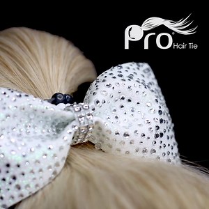 11K views · 102 reactions | Cheer bows  are gorgeous. But sometimes you need a little extra hold. The PRO Hair Tie will securely hold your hair throughout the competition and it WILL NOT rip your hair out after. Focus on your sport, not your hair. | Cheerleading Stunt Stand | Facebook