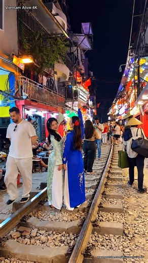 Perfect Pose! 🇻🇳 Two Girls in Áo Dài at Hanoi Train Street