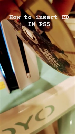 how to insert CD IN PS5