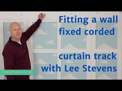 Fitting a wall fixed corded curtain track
