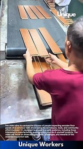 Wooden floor panel inspection: people inspecting wooden floor panels on a conveyor belt
