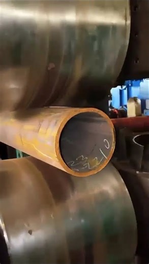 Cold forming process of reshaping circular steel tubing into a square profile using a rolling mill.