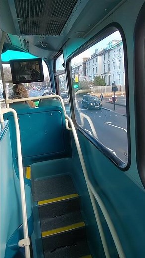 Inside top cabin of double decker bus in London