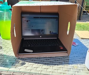 How to see your laptop screen while working in the sun & you just need a box