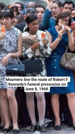 Mourners line the route of Robert F. Kennedy’s funeral procession on June 8, 1968.