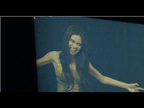 Behind the scenes: Erich as snake-woman in mall