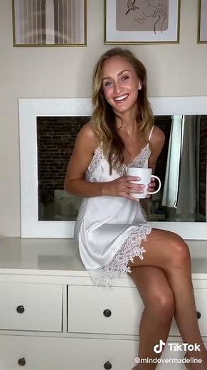 Housewife wearing a silk robe & lingerie in the kitchen