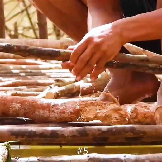 Watch this amazing bamboo bridge get made!