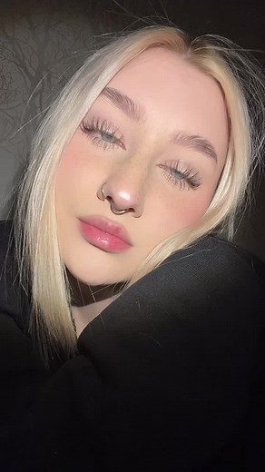 Captivating Close-Up of Long Blonde Hair in Dim Lighting