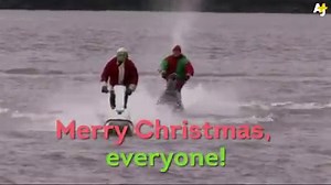 After a long day's work, Santa gets on his jet ski and takes a break. | AJ