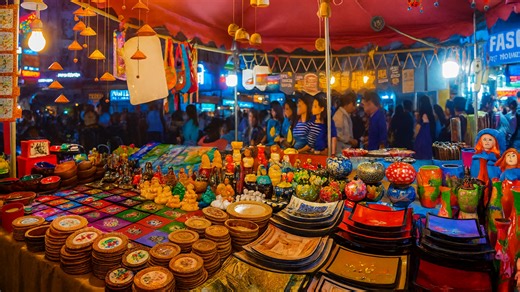 Walking through Hanoi’s night market streets