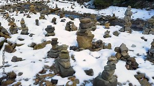 stone structures land art pyramids in the valley of the Zhenets river, Ukraine, Carpathians were left by tourists who really love these places on the way to the Guk waterfall