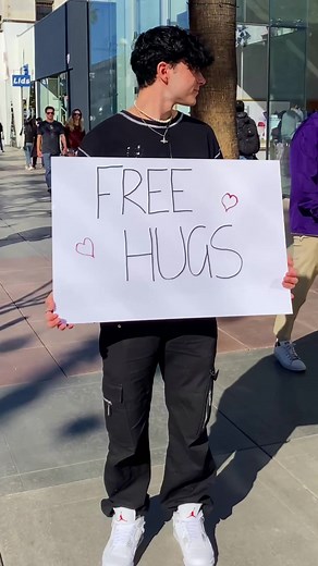 Spreading Kindness: Giving Free Hugs to Strangers in Public