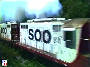 We'd imagine no railroad in public view would be able to pull this off these days, but in the mid 1980s, four SOO Line geeps suffering from poor maintenance are lugging a heavy train out of the Shoreham Yard in Minneapolis, MN. From the C-Vision Productions show "Best of SOO, Part 1" https://rfd.video/BestSOO1 | Railfan Depot