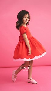 In pink and red with scallop trims, her new party look is here. | seed | Facebook