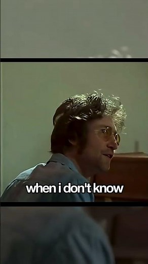 John Lennon showing George Harrison his unfinished song