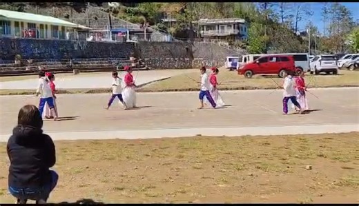 Sakuting is a traditional Philippine folk dance originating from the province of Abra, depicting the historical struggle between Ilocano Christians and non-Christians through rhythmic movements and stick fighting. Congratulations dancers and coaches. | Magani Melonie Maglia