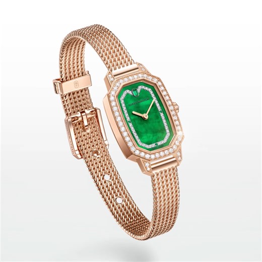 Jewelry meets horology in this striking Emerald model. Finished with sparkling diamonds and a luminous green mother-of-pearl dial, the timepiece is embraced by an 18k rose gold Milanese mesh bracelet that moves as fluidly as time itself. Elevate the art of time with this Emerald design: https://harry-winston.visitlink.me/ejgvF2 #HarryWinston #HWEmerald | Harry Winston