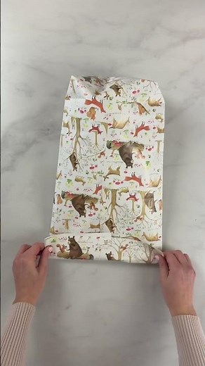 The best way to wrap by making a custom gift bag 🧸 #wrapping #crafting #giftideas #giftwrapping