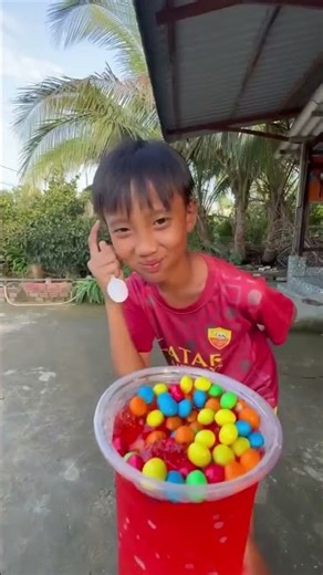 A cup of red ice cream and lots of colorful candy balls #shorts