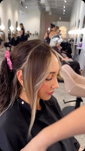 A statement face frame moment from Kim Haberley AKA @iambohoblonde as she talks through her process in making the blonde pop through this look! This client’s bright blonde face-framing piece is partnered with a cut that complements the colour for a beautiful, blended finish #hair #hairdressing #hairdressers #hairstylist #faceframing #faceframinghair #blendedhair #hairinspiration #brunette #blondehair #twotonehair #creativecutting #creative | Creative HEAD Magazine