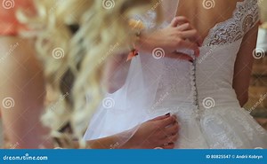 Wedding Preparation, Wedding Gown Being Tied Up by Bridesmaid Stock Video - Video of person, bind: 80825547