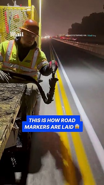 Workers reveal how reflective road markers are laid