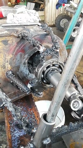 REPAIRING EXCAVATOR'S DIPPER STICK AFTER WORN HOLE MAG BUILT UP IN MECHANICAL WORKSHOP