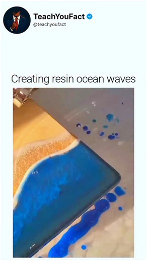 teachyoufact on Instagram: "The post features a 26-second video tutorial on crafting epoxy resin ocean waves, showing pours of blue resin for water and white for foam over a sandy wooden base, shaped with a squeegee and brush for realistic crashing effects. Epoxy resin cures through an exothermic polymerisation reaction, allowing brief fluidity for wave manipulation before hardening into a durable, translucent medium that captures light like genuine seawater, as detailed in polymer chemistry res