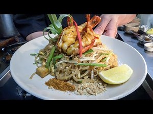 Pad Thai Noodles with King Prawns Tasted in London. Street Food Dish. Patara Thai Restaurant