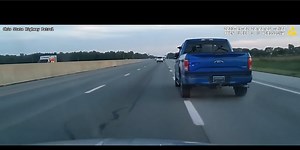 WATCH: New video shows Monroe deadly carjacking suspects shoot at troopers during I-75 chase