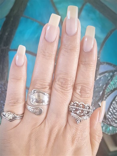 Rings stack of the day ✨️ Again I pretty much didn't put much thought into today's ring stack, I layered the pointer finger rings and the pinkie rings for the ring finger I just added a spoon ring 💍 simple silver ring stacking. My nails are natural, all I'm using is nail polish there's a faithful nail routine I've been following for decades to keep my nails growing long, natural and strong 💪 I'll continue to share tips for growing long natural nails 💅 maximalist aethstetic #jewelry #bracelet 