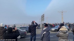 World's largest plane cuts clear path through fog during landing