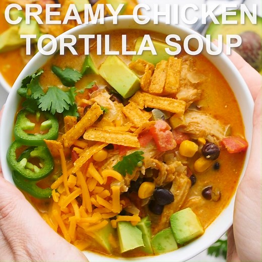 This Creamy Chicken Tortilla Soup recipe is easy to make on the stove top or the Crock Pot. Make it with fresh, leftover, or rotisserie chicken. Cheddar and Cream Cheese add a hint of creamy indulgence! Recipe: https://thecozycook.com/creamy-chicken-tortilla-soup/ | The Cozy Cook