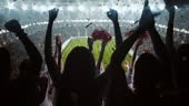 4k video of a group of cheering fans watch a sport championship on...