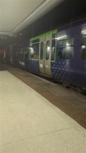 class 334 departing Glasgow Queen Street for Edinburgh Waverley