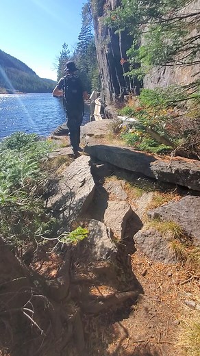More from an amazing hike in the Adirondack Mountains where you hike up a trail to find this amazing lake surrounded by giant cliffs! #adirondackmountains #adirondacks #adirondacksny | The Nature Seeker