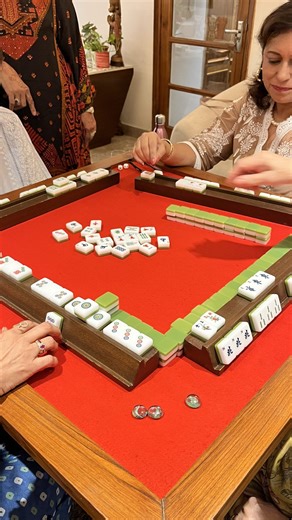 9.9K views · 47 reactions | India is seeing a rise in the number of mahjong clubs opening in its bigger cities as more people start to enjoy this game of skill and strategy. For some, mahjong also evokes the senses of touch, sound and sight as they shuffle and stack the attractive tiles. #Worldwide #2024G20 https://news.cgtn.com/news/2024-11-09/Chinese-game-of-mahjong-gaining-popularity-in-India-1yo6p0bGdPi/p.html | China Plus Culture | Facebook