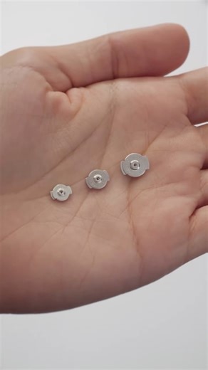Stuller, Inc. on Instagram: "Upgrade your earring security with our more secure earring backs. Available in 3 different pad sizes, they’re easy to slide on and off the post, ensuring your earrings stay in place while adding a customizable fit. ✨ Comment “findings” for a link to shop these secure earring backs. #Earrings #EarringBacks #FineJewelry #Findings #Jeweler"