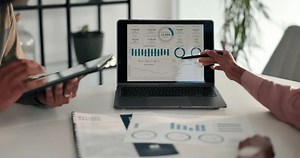 clip-3718488965-dashboard-hands-people-graphs-laptop-sales-charts