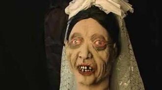 6' Restless Groom Holding Bride's Head