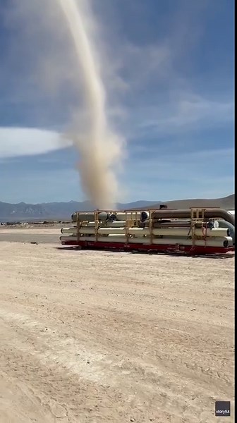 Immense Dust Devil Dwarfs Mountains in Northern Nevada