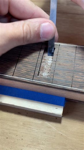 2.7K views · 265 reactions | Inlaying a birch block in a wenge board for this new Ruby I’m working on. These two woods could not be less alike, but they look nice together! . . . #guitar #woodworking #wood #acousticguitar #customguitar #handmade #guitarmaking #guitarbuilding #acoustic #luthier | Michael Lavecchia | Facebook