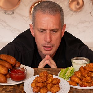 379K views · 9.4K reactions | I’m in the US, so I’m diving into the world of classic American food inventions. From the spicy kick of buffalo hot wings, the crispy delight of tater tots, to the nostalgic fun of corn dogs, we're exploring the flavours and recipes behind these iconic dishes. Plus, a little guest appearance from Joshua Weissman! | Andy cooks | Facebook